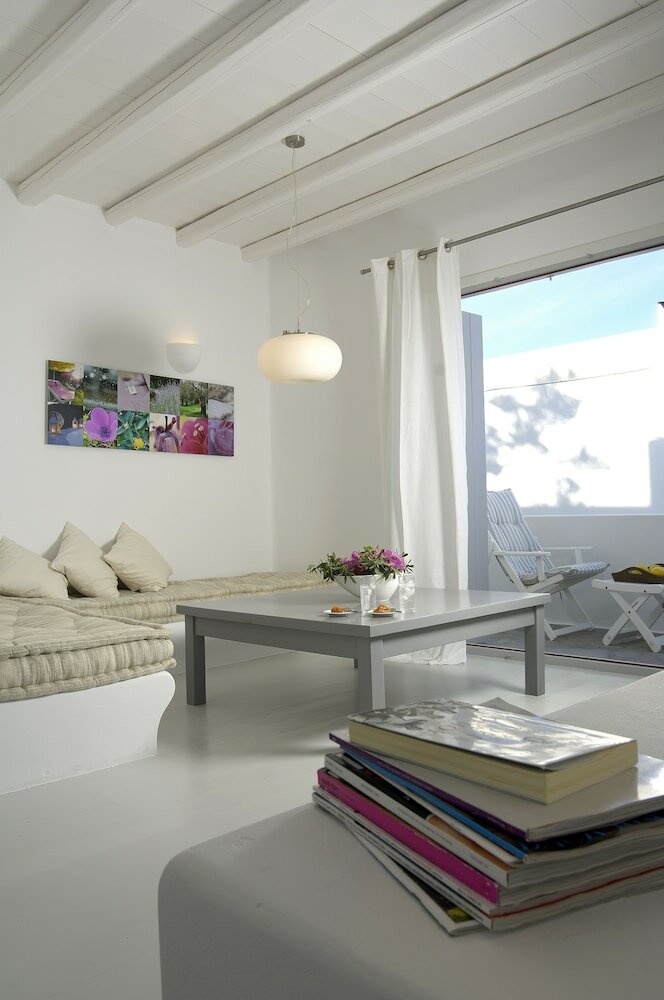 Фото Kapetan Tasos Suites