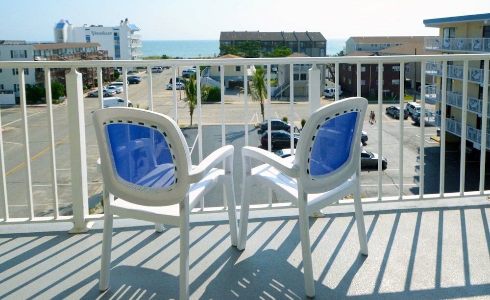 Фото Coastal Palms Inn & Suites