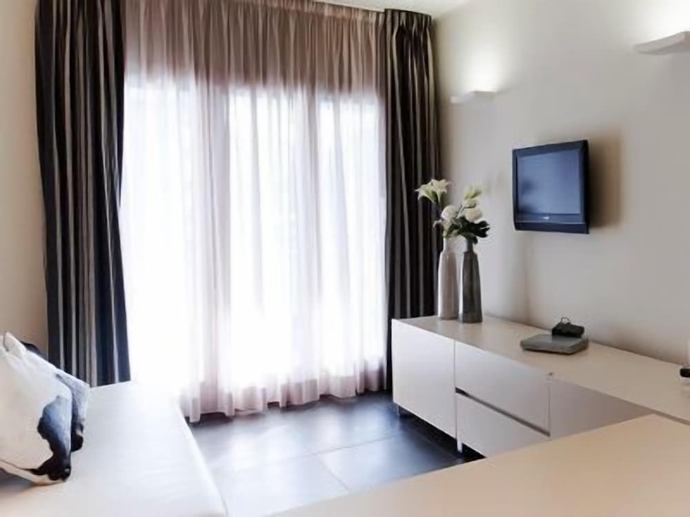 Фото Home Club Suite Hotel
