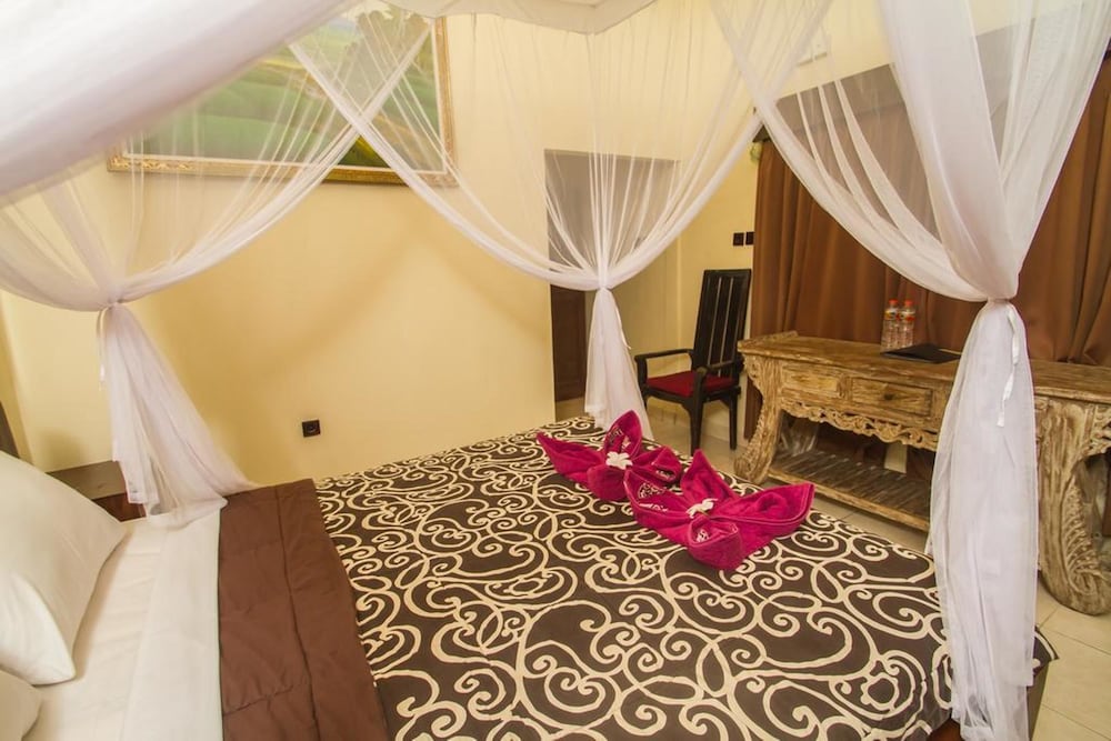 Фото Omah D'Taman Hotel by Eps