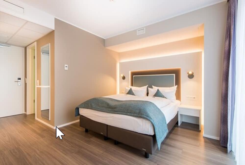 Фото Stadthotel Freiburg