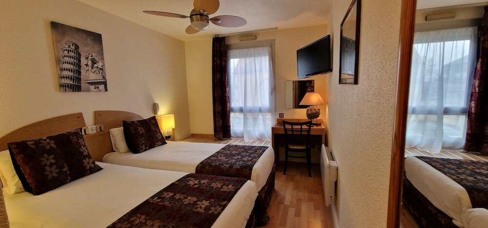 Фото Kyriad Direct Arpajon