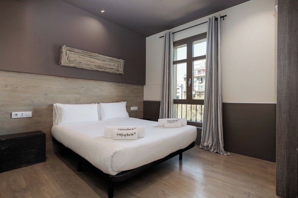 Фото Enjoybcn Miro Apartments