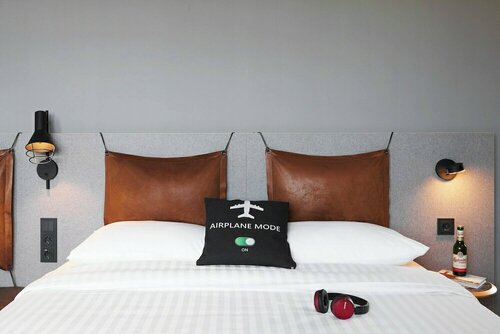 Гостиница Moxy Cologne Bonn Airport в Весселинге