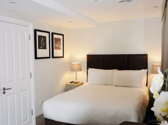 Фото Tophams Hotel