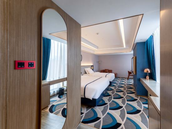 Фото Kunming Guandu Fontoo Hotel