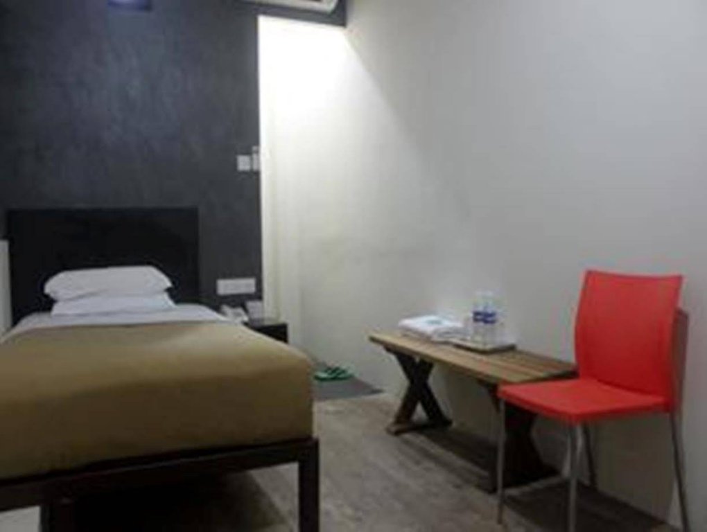 Фото Oyo 728 Tai Pan Hotel