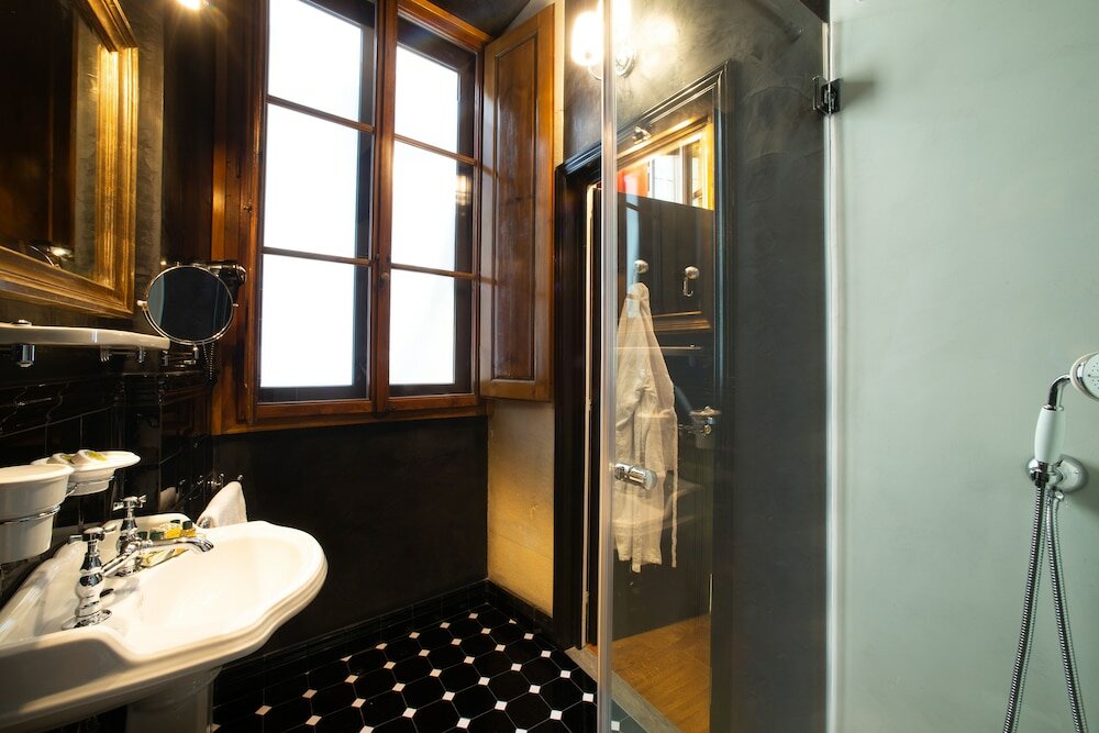 Фото Boutique B&b Torre De' Conti