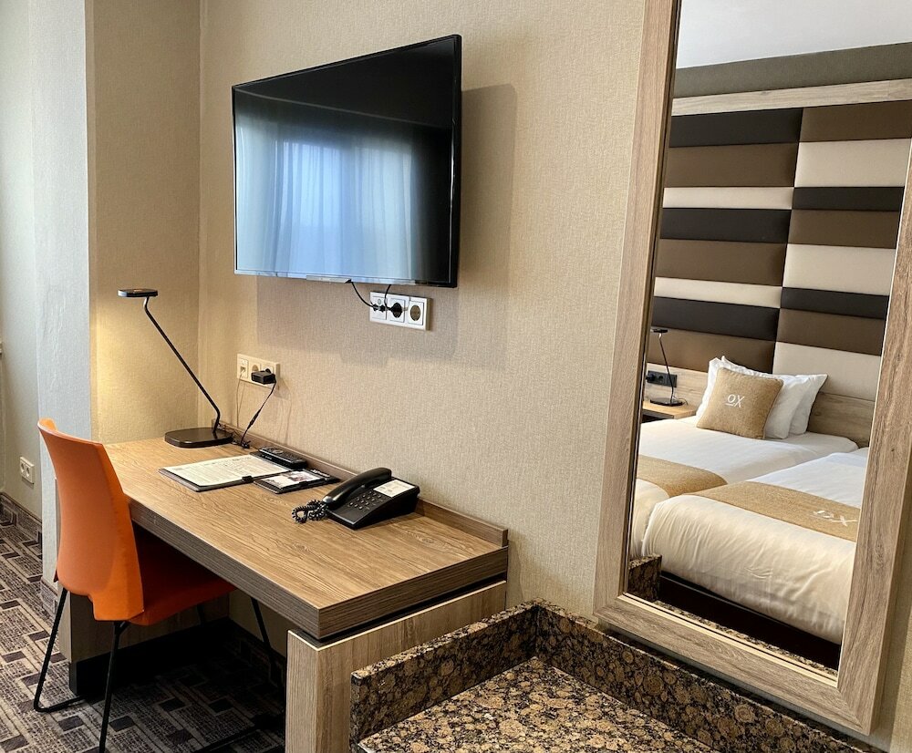 Фото Xo Hotels Blue Tower