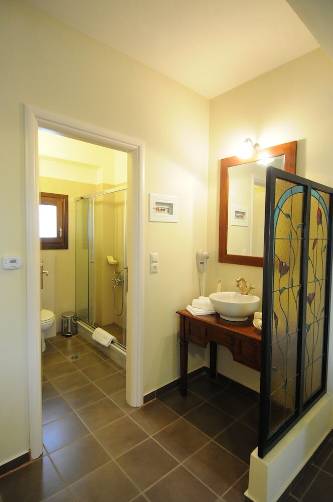 Фото Porto Mani Suites