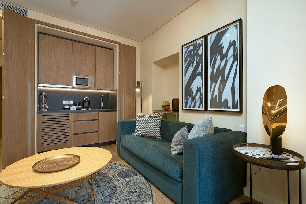 Фото Suites Murillo Plaza Sta Cruz