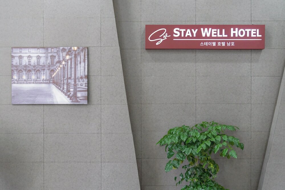 Фото Staywell Hotel