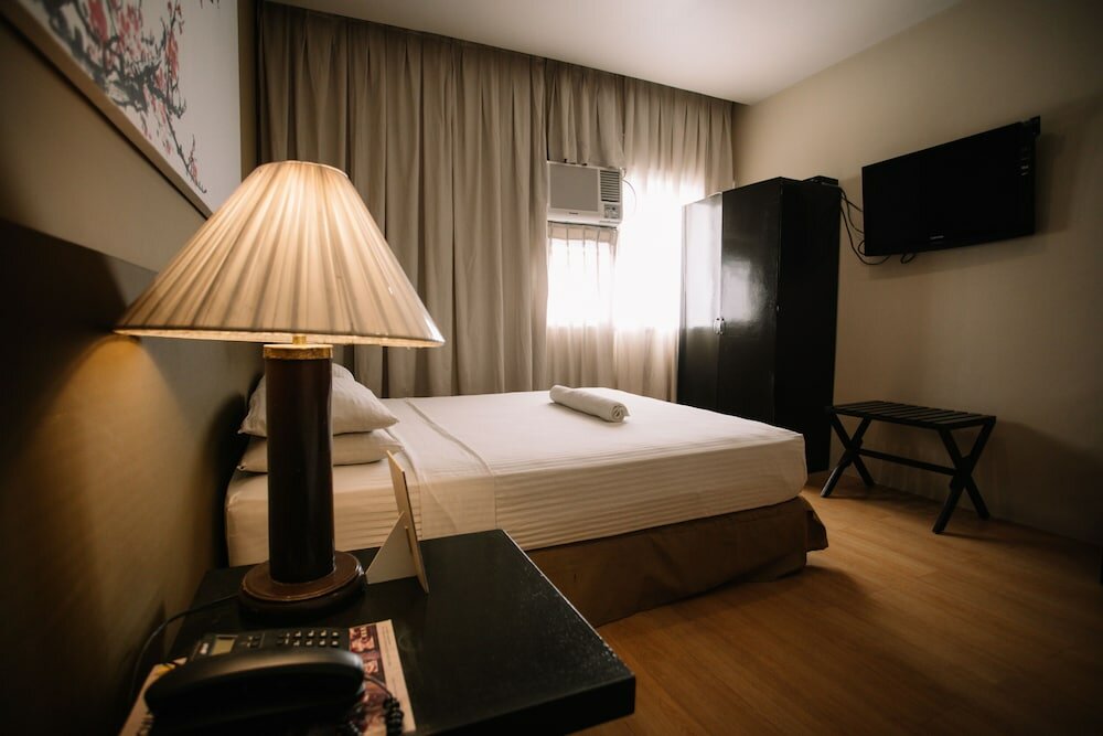 Фото Dynasty Tourist Inn