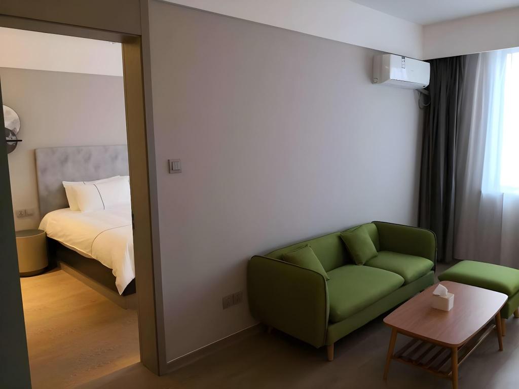 Фото Magnotel Jining Jiaxiang, Zengzi Avenue Hotel