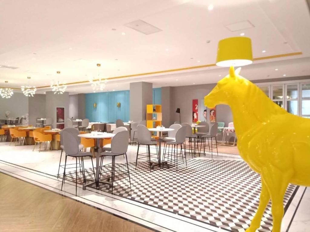 Фото Magnotel Jining Jiaxiang, Zengzi Avenue Hotel