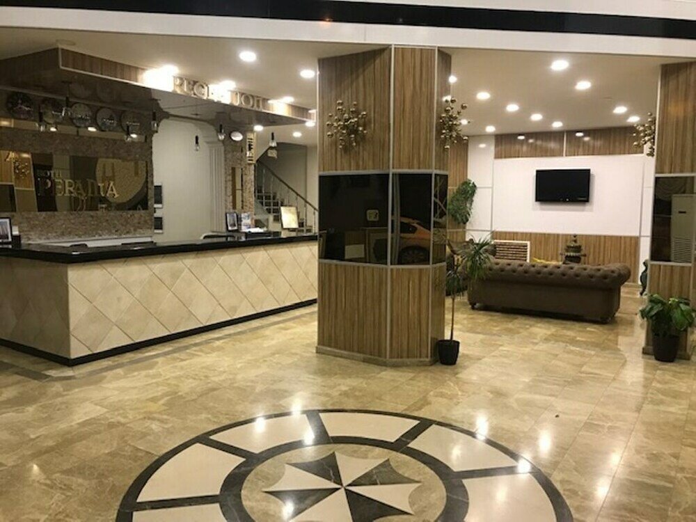 Фото Perama Hotel