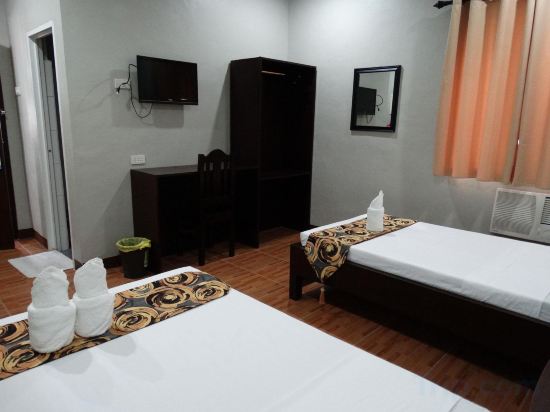 Фото Harbour Gardens Tourist Inn