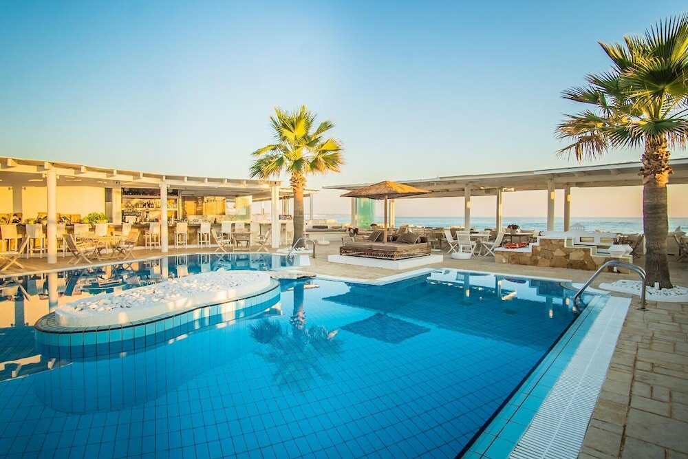 Фото Parthenis Beach Suites by the Sea