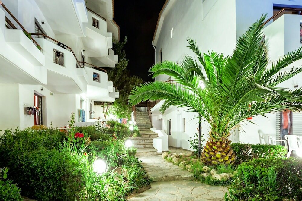 Фото Xenios Dolphin Beach Hotel