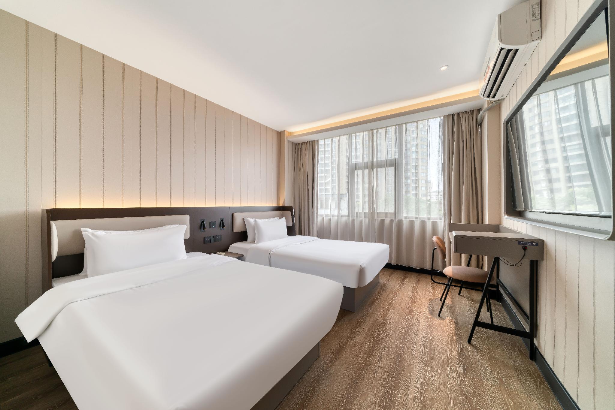 Фото Ebo Hotel Hangzhou Wulinmen