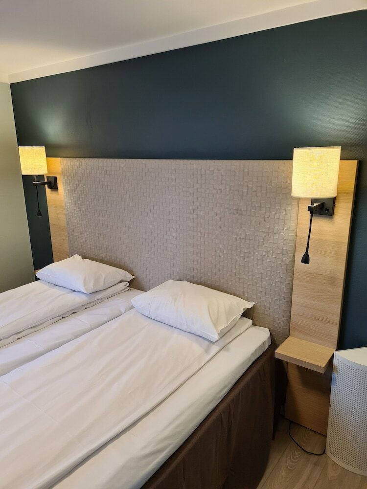 Фото City Living Schøller Hotel