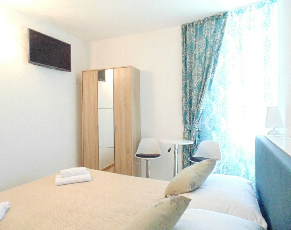 Фото Peruzovic Rooms & Apartments