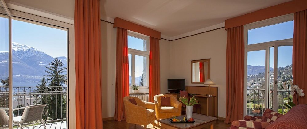 Фото E-Rooms Minusio