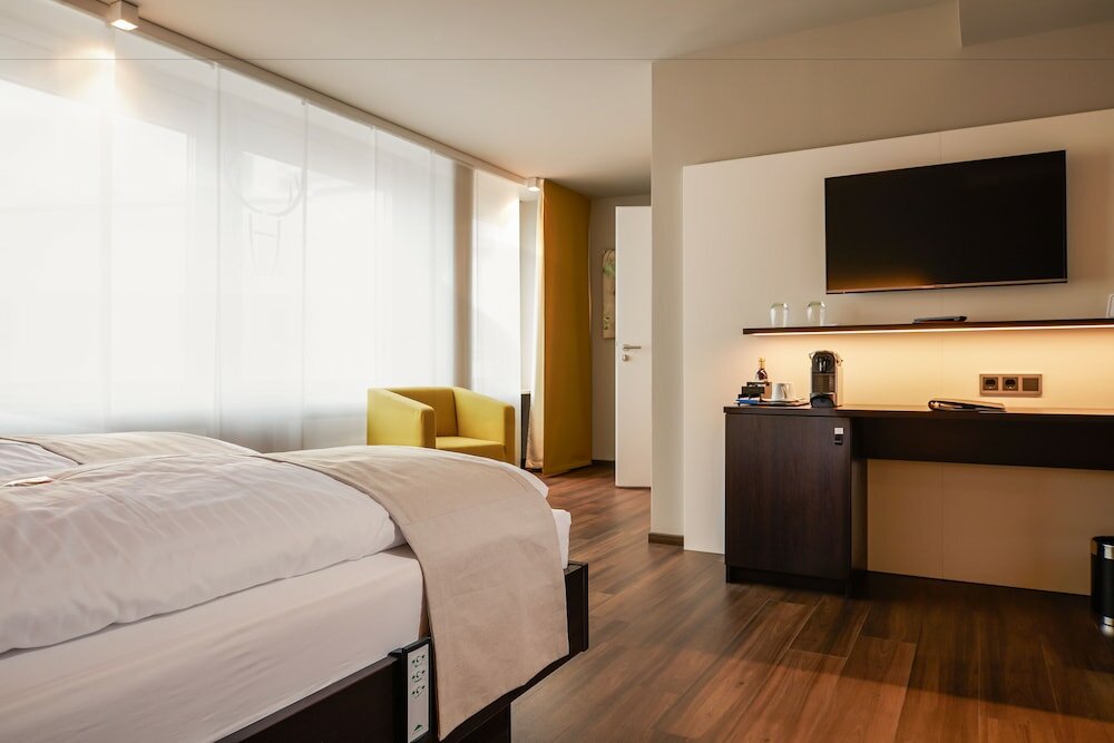 Фото Hotel Platzhirsch