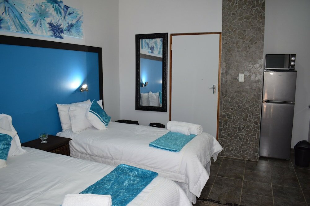 Фото Oppi Hoek Guesthouse