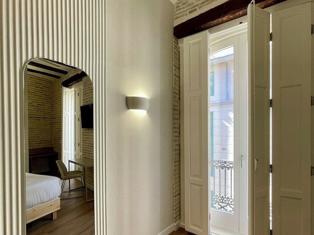 Фото Cosy Rooms Embajador