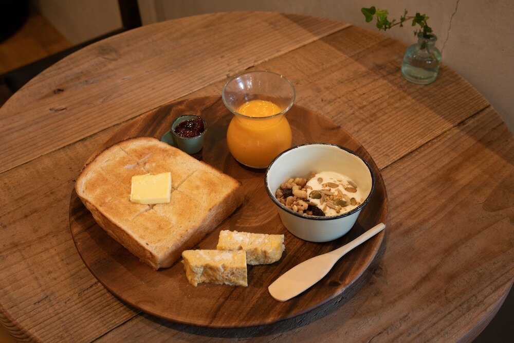 Фото Akicafe Inn Guesthouse