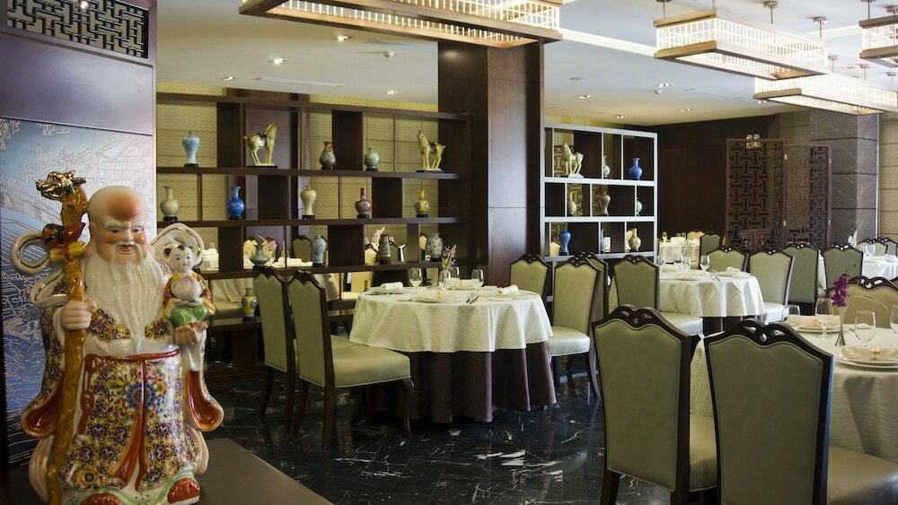 Фото Tang Palace Hotel