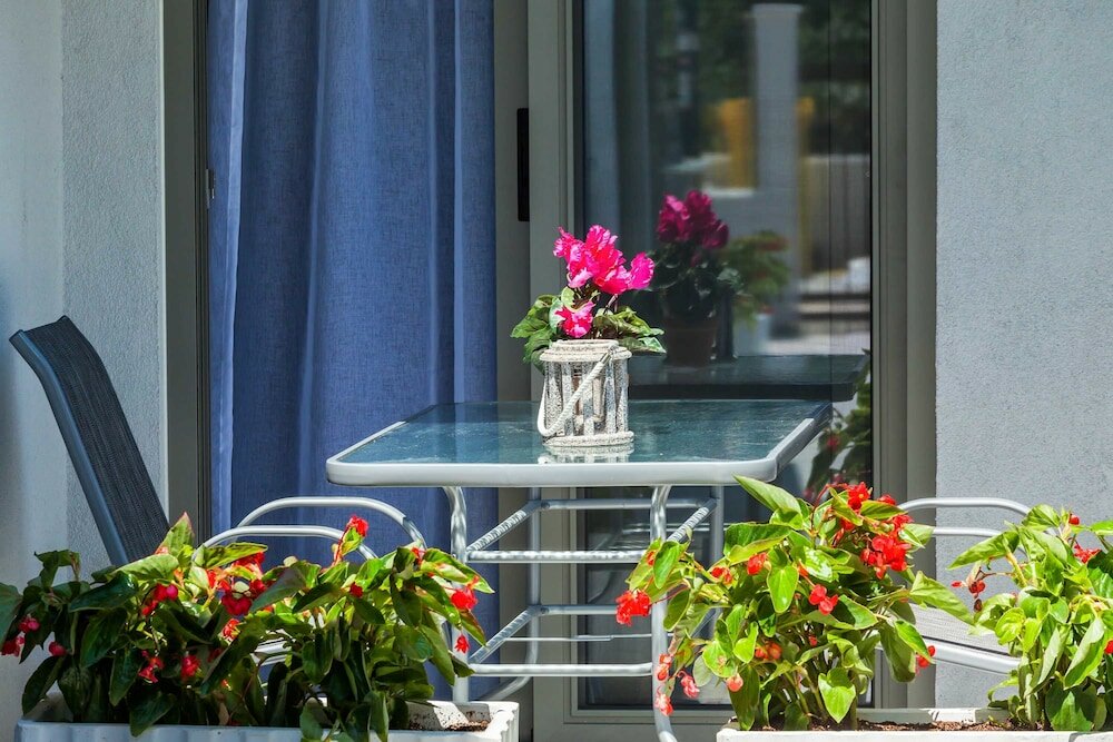 Фото Nymphes Deluxe Accommodation