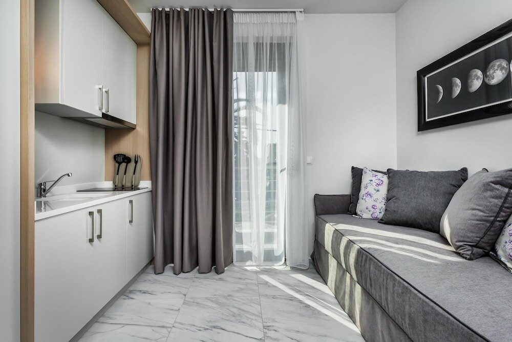 Фото Nymphes Deluxe Accommodation