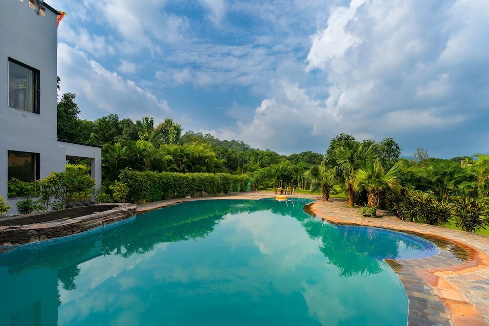 Фото Corbett Wild Resort - A River Access Property