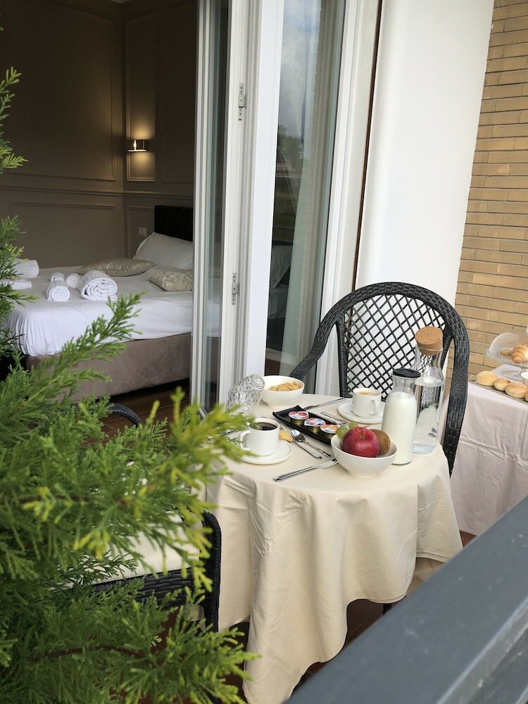 Фото Unicum Roma Suites