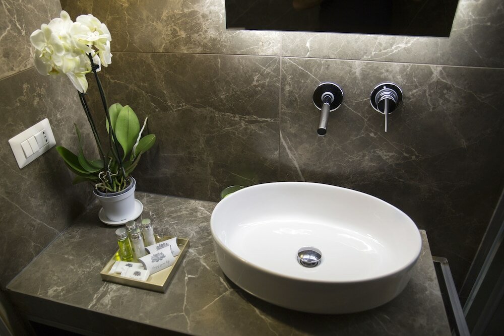 Фото Unicum Roma Suites