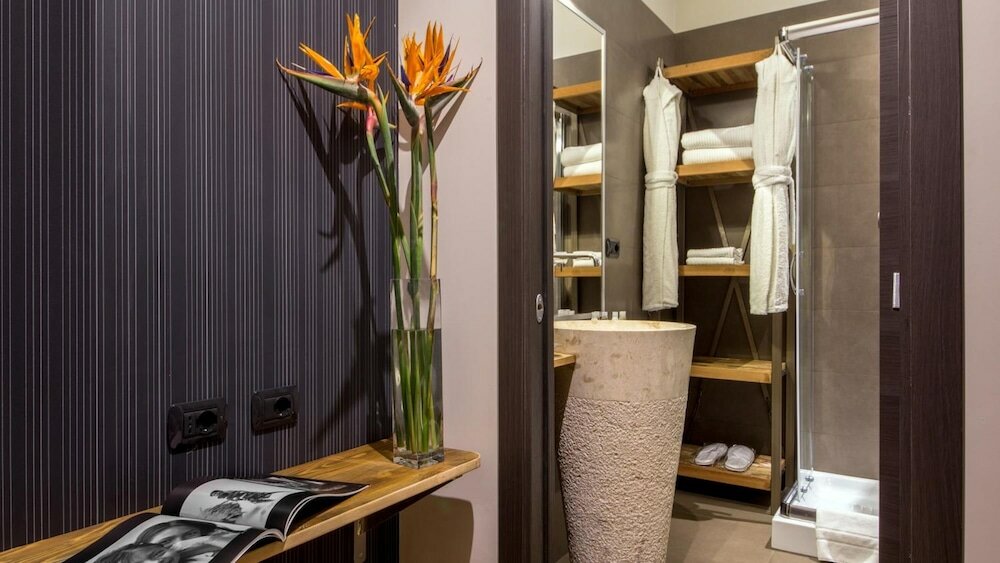 Фото Qt Suites Roma