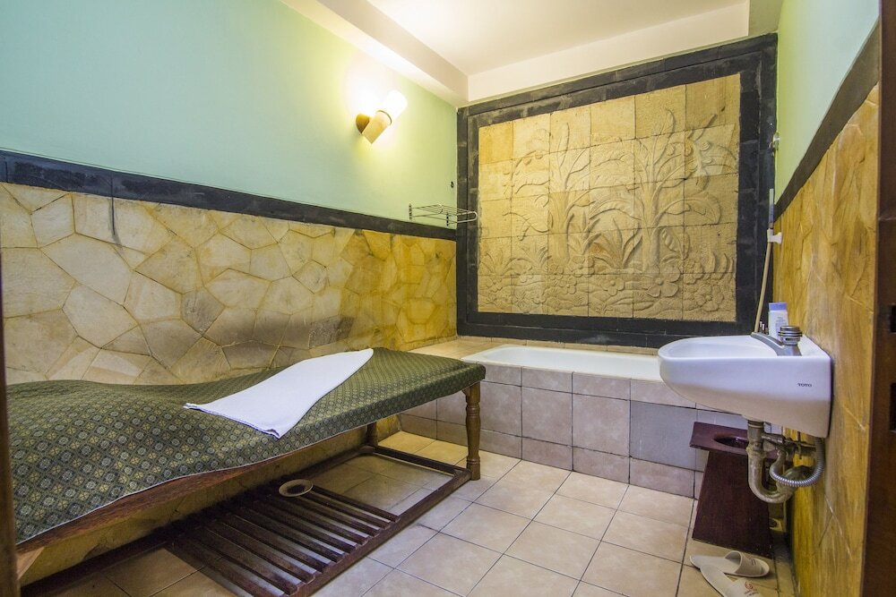 Фото Grand Candi Hotel