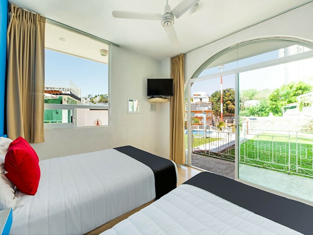 Фото Capital O Hotel El Mejicano