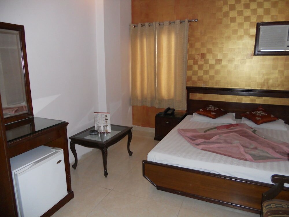 Фото Hotel Amax Inn