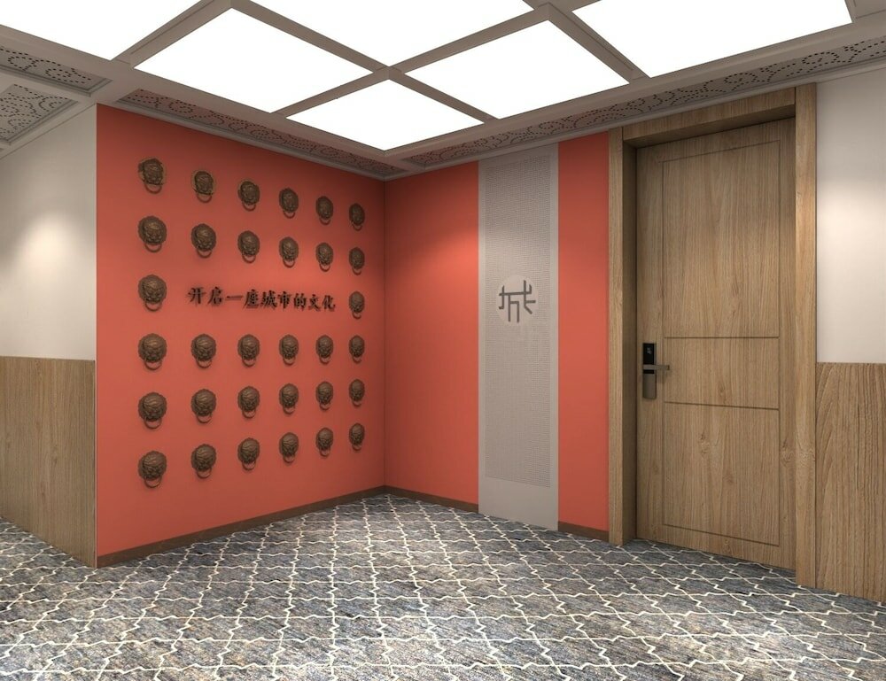 Фото Happy Dragon Saga Hotel (Beijing Tiananmen Wangfujing)