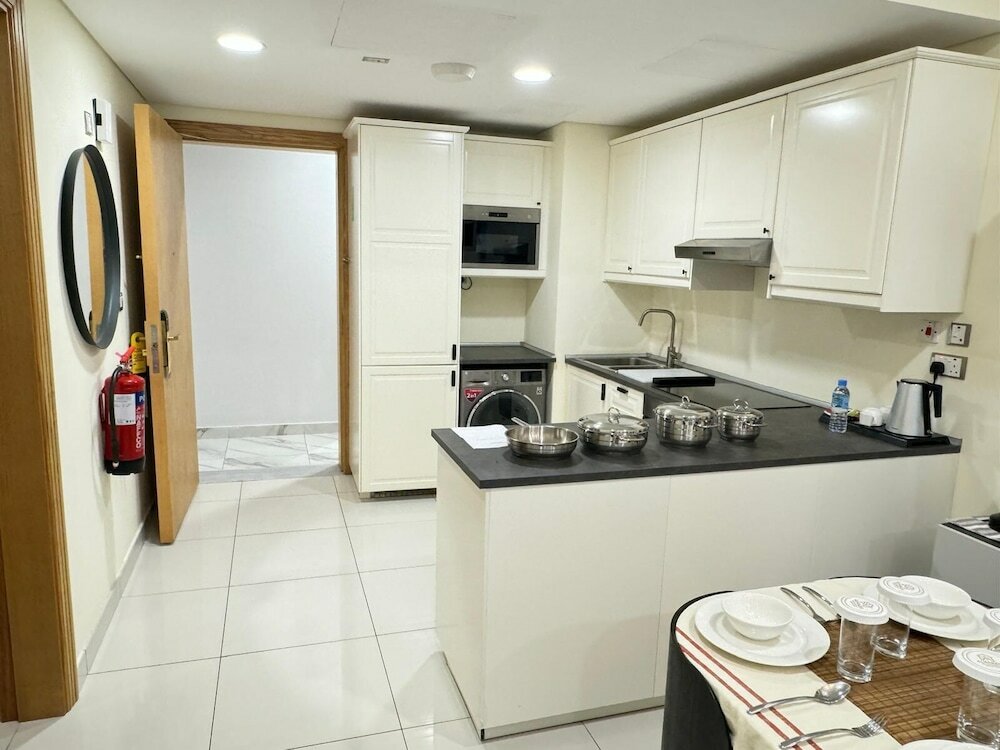 Фото Al Manzil Residence & Suites