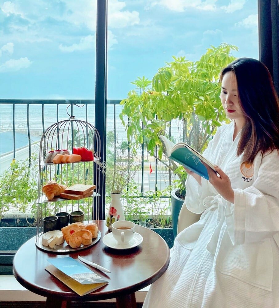 Фото Nesta Hotel Da Nang