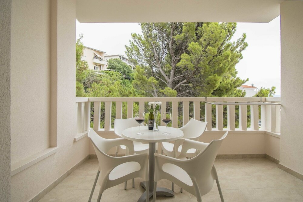 Фото Aparthotel Flora