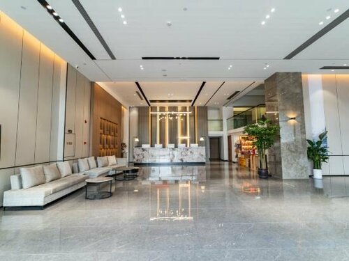 Гостиница Guangmingren Wellness Hotel в Сямыне