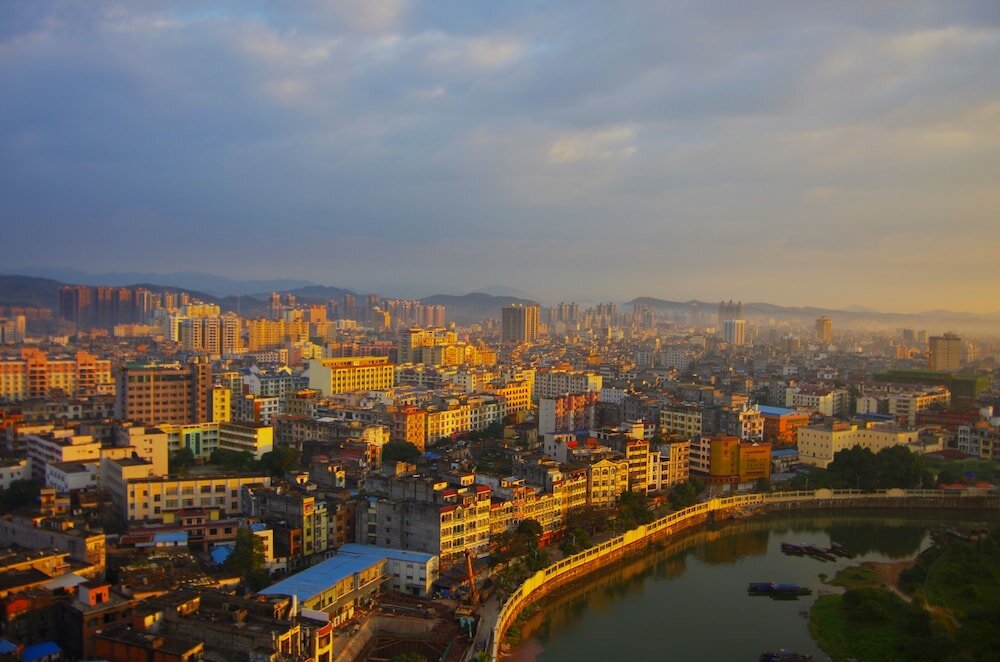 Фото Ramada Plaza Dongxing City Center