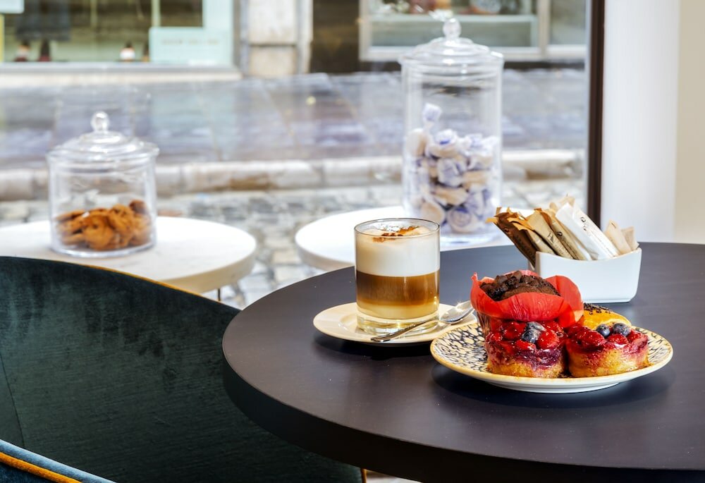 Фото Eurostars Puerta Real Hotel