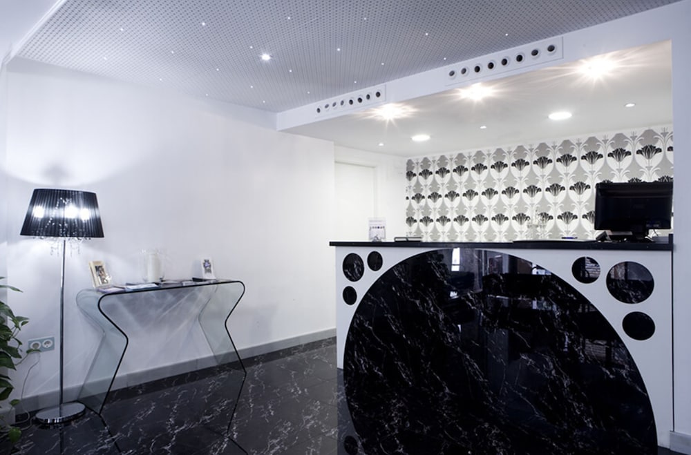 Фото Hotel La Boutique Puerta Osario