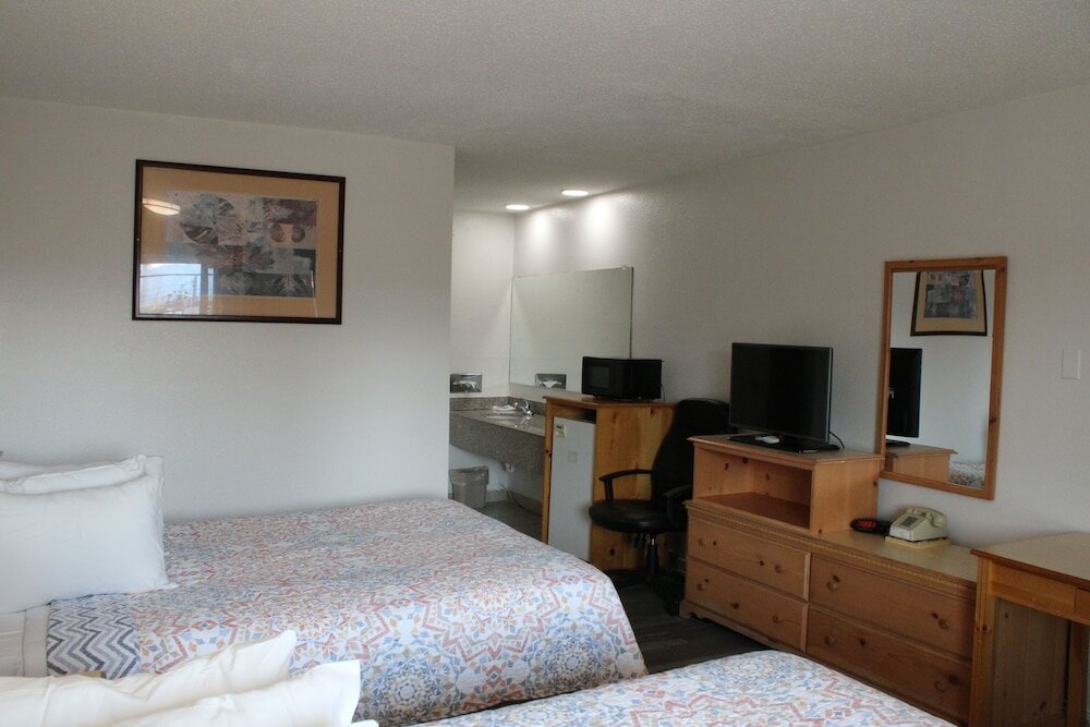 Фото Tiki Lodge Motel